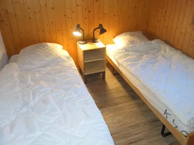Ein Bett oder Betten in einem Zimmer der Unterkunft Apartment for 10 in Veysonnaz