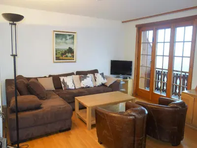 Ein Sitzbereich in der Unterkunft Valley-view apartment in Veysonnaz
