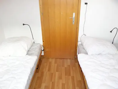 Ein Bett oder Betten in einem Zimmer der Unterkunft Valley-view apartment in Veysonnaz