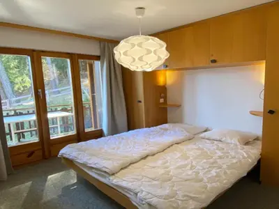 Ein Bett oder Betten in einem Zimmer der Unterkunft Apartment in Veysonnaz with valley view