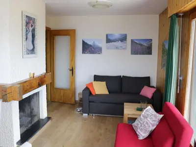 Ein Sitzbereich in der Unterkunft 2-room apartment in Veysonnaz