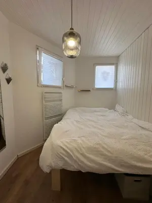 Ein Bett oder Betten in einem Zimmer der Unterkunft Les terrasses de Valère