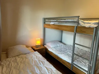 Ein Bett oder Betten in einem Zimmer der Unterkunft Apartment Veysonnaz near Ski Lift 4 Vallées