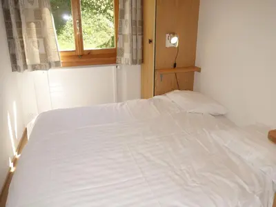 Ein Bett oder Betten in einem Zimmer der Unterkunft Apartment in Veysonnaz with Private Balcony