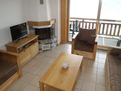 TV/Unterhaltungsangebot in der Unterkunft Cosy apartment with balcony