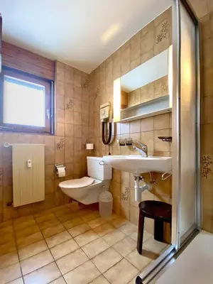 Ein Badezimmer in der Unterkunft Adler Residenz 14