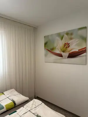 Ein Bett oder Betten in einem Zimmer der Unterkunft Gemütliche Wohnung im Haus Pfeiren