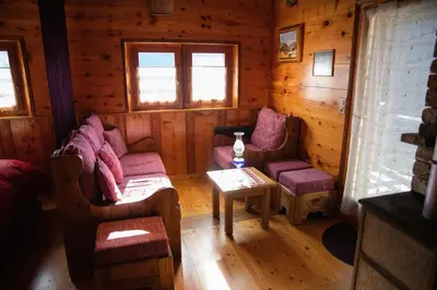 Ein Sitzbereich in der Unterkunft Chalet 