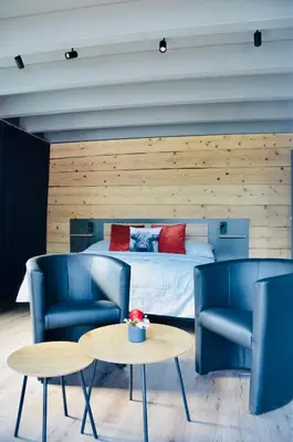 Ein Sitzbereich in der Unterkunft Q Lodge 103
