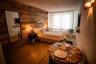 Ein Bett oder Betten in einem Zimmer der Unterkunft LUMA appartment Zermatt