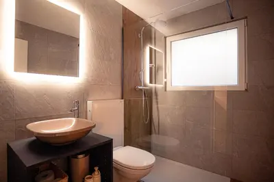 Ein Badezimmer in der Unterkunft LUMA appartment Zermatt