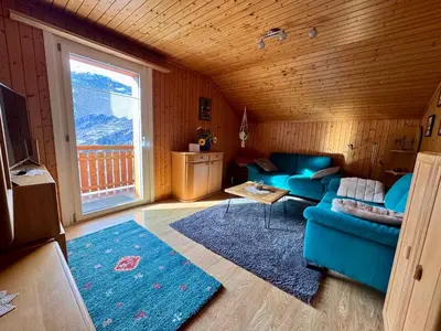 Ein Sitzbereich in der Unterkunft Staldenried Ferienwohnung