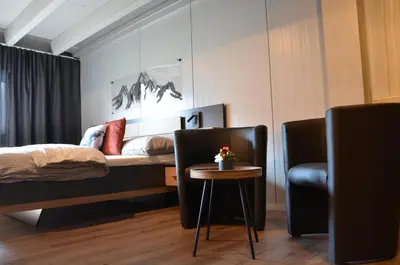 Ein Bett oder Betten in einem Zimmer der Unterkunft Q-Lodge 104