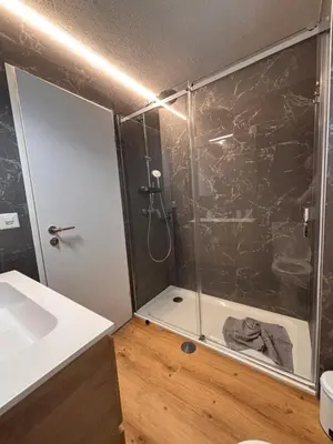 Ein Badezimmer in der Unterkunft Luxuse Ferienwohnung Flüe 11