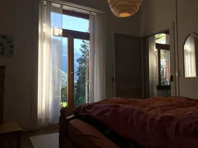 Ein Bett oder Betten in einem Zimmer der Unterkunft Wild Valley Ticino Villa in Valle Onsernone