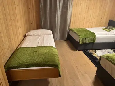 Ein Bett oder Betten in einem Zimmer der Unterkunft Bellevue Apartment