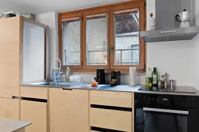 Küche/Küchenzeile in der Unterkunft Maison 9 personnes a Venthône, sauna et vue