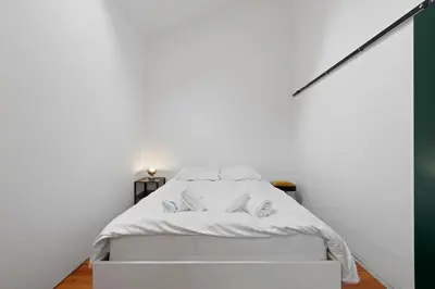 Ein Bett oder Betten in einem Zimmer der Unterkunft Maison 9 personnes a Venthône, sauna et vue