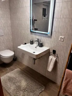 Ein Badezimmer in der Unterkunft Chalet Duque