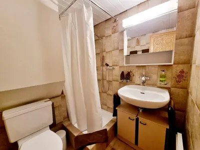 Ein Badezimmer in der Unterkunft MOM - Alpine Boutique Apartments, Grindelwald gletscher, Eiger View Terrace Studio