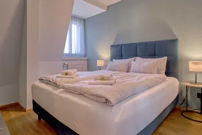 Ein Bett oder Betten in einem Zimmer der Unterkunft BANK House Apartment XL 404 - GRIWA RENT
