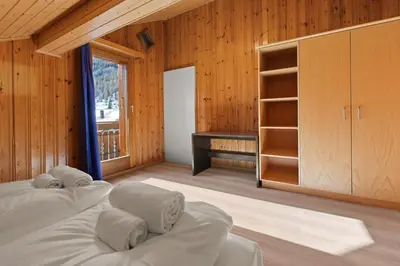 Ein Bett oder Betten in einem Zimmer der Unterkunft Bel appartement alpin à 5 min de Saas-Fee