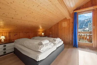 Ein Bett oder Betten in einem Zimmer der Unterkunft Bel appartement alpin à 5 min de Saas-Fee