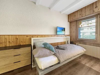Ein Bett oder Betten in einem Zimmer der Unterkunft Slopeside Studio - 4 Valleys - Swiss Alps