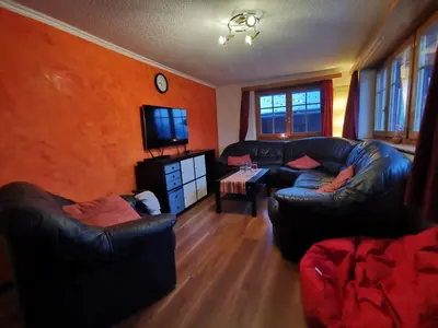 Ein Sitzbereich in der Unterkunft Chalet Sandgrube
