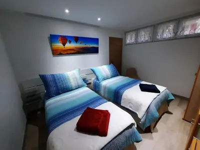 Ein Bett oder Betten in einem Zimmer der Unterkunft Appartement au bord de l'eau 33m2 Le Cerisier
