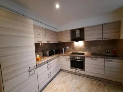 Küche/Küchenzeile in der Unterkunft Appartement au bord de l'eau 33m2 Le Cerisier