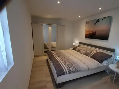 Ein Bett oder Betten in einem Zimmer der Unterkunft Appartement au bord de l'eau 43m Les Hirondelles