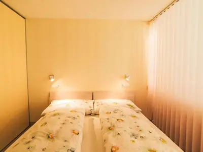 Ein Bett oder Betten in einem Zimmer der Unterkunft Apartment Cristal-4 by Interhome