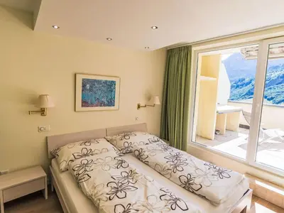 Ein Bett oder Betten in einem Zimmer der Unterkunft Apartment Cristal-10 by Interhome