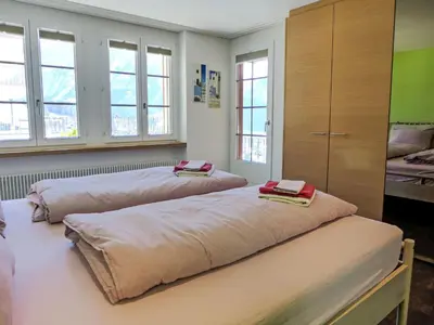 Ein Bett oder Betten in einem Zimmer der Unterkunft Apartment Chalet Adlerhorst OG by Interhome