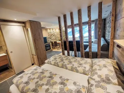 Ein Bett oder Betten in einem Zimmer der Unterkunft Apartment Cristal-7 by Interhome