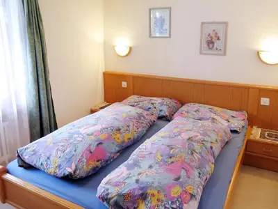 Ein Bett oder Betten in einem Zimmer der Unterkunft Apartment Venetz-4 by Interhome