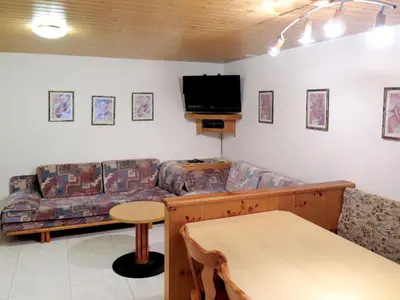 Ein Sitzbereich in der Unterkunft Apartment Haus Quelle-1 by Interhome