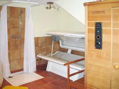 Ein Etagenbett oder Etagenbetten in einem Zimmer der Unterkunft Apartment Haus Quelle-1 by Interhome