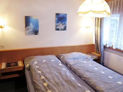 Ein Bett oder Betten in einem Zimmer der Unterkunft Apartment Haus Quelle-1 by Interhome