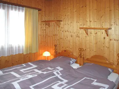 Ein Bett oder Betten in einem Zimmer der Unterkunft Holiday Home Edelweiss-2 by Interhome