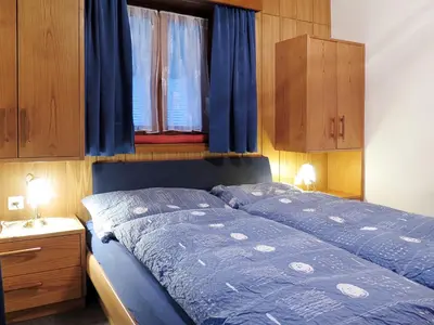 Ein Bett oder Betten in einem Zimmer der Unterkunft Apartment Haus Quelle-5 by Interhome