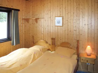 Ein Bett oder Betten in einem Zimmer der Unterkunft Holiday Home Edelweiss-1 by Interhome