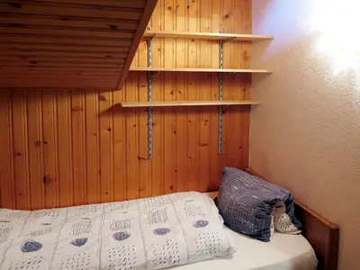 Ein Bett oder Betten in einem Zimmer der Unterkunft Apartment Haus Quelle-3 by Interhome