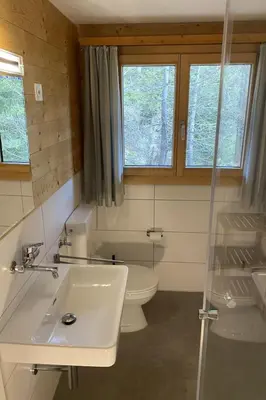 Ein Badezimmer in der Unterkunft Chalet Chalet Soldanella - BEL205 by Interhome