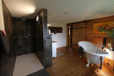 Ein Badezimmer in der Unterkunft Bijoux mit Blick auf Blüemlisalp