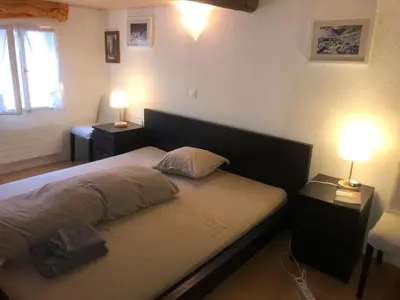 Ein Bett oder Betten in einem Zimmer der Unterkunft Charming Swiss Chalet Andermatt