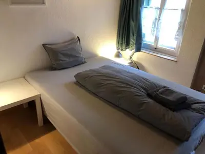 Ein Bett oder Betten in einem Zimmer der Unterkunft Charming Swiss Chalet Andermatt