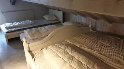 Ein Bett oder Betten in einem Zimmer der Unterkunft Charming Swiss Chalet Andermatt