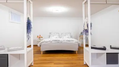 Ein Bett oder Betten in einem Zimmer der Unterkunft Thunersee Retreat